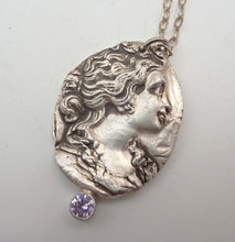 Load image into Gallery viewer, Cameo Pendant, Fine Silver with Tube-Set Tanzanite Hemstone
