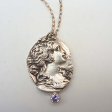 Load image into Gallery viewer, Cameo Pendant, Fine Silver with Tube-Set Tanzanite Hemstone